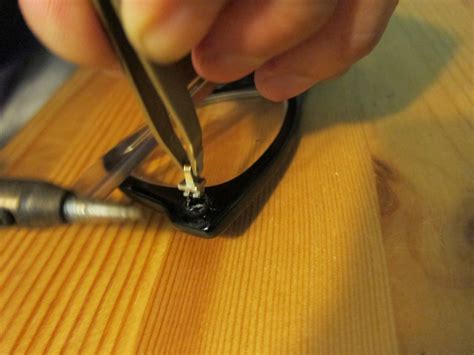 how to repair broken glasses hinge